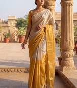 Off white woven design tissue kasavu saree