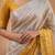 Off white woven design tissue kasavu saree