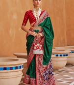 Green ethnic motifs woven design patola saree