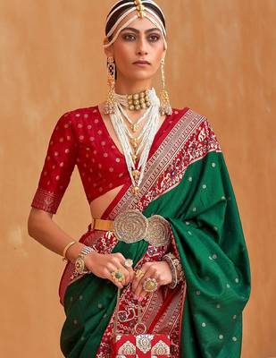 Green ethnic motifs woven design patola saree 2