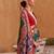 Green ethnic motifs woven design patola saree