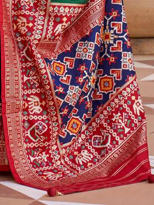 Green ethnic motifs woven design patola saree 4