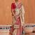 Cream cream-coloured & red woven design zari silk blend patola saree