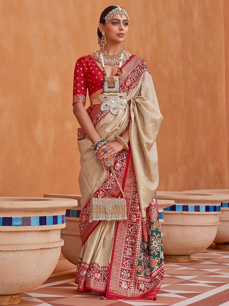 Cream cream-coloured & red woven design zari silk blend patola saree