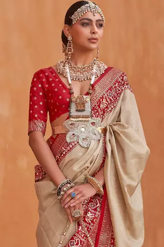 Cream cream-coloured & red woven design zari silk blend patola saree