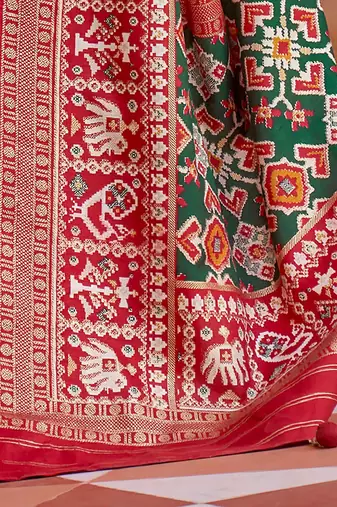 Cream cream-coloured & red woven design zari silk blend patola saree