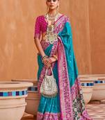 Blue polka dots woven design zari patola saree