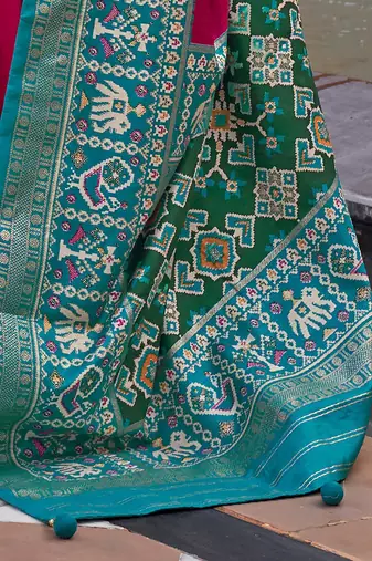 Pink polka dots woven design zari patola saree