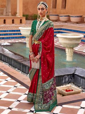 Red ethnic motifs woven design zari patola saree 1