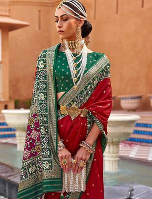 Red ethnic motifs woven design zari patola saree 2