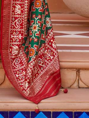 Olive ethnic motifs woven design zari patola saree 4