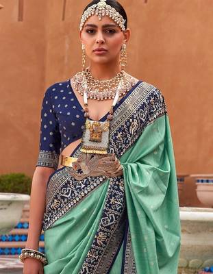 Sea green woven design zari silk blend patola saree 2