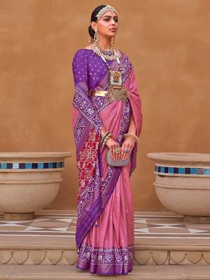 Mauve ethnic motifs woven design zari patola saree 1