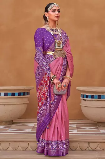 Mauve ethnic motifs woven design zari patola saree