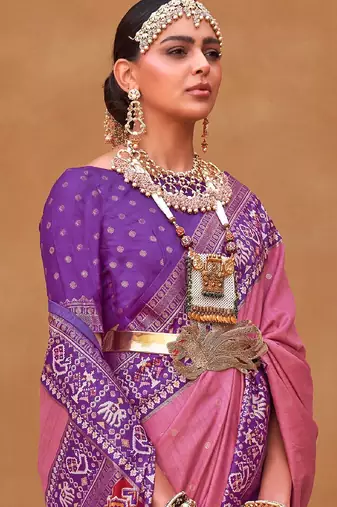 Mauve ethnic motifs woven design zari patola saree