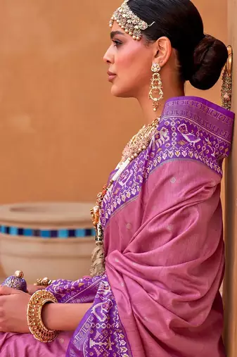 Mauve ethnic motifs woven design zari patola saree