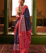Blue woven design zari silk blend ikat saree