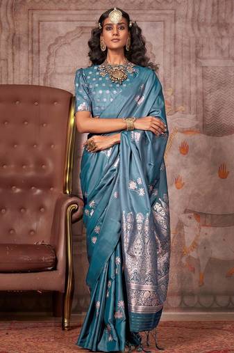 blue women woven design zari satin gadwal saree