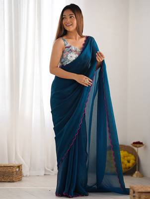 teal embroidered party wear saree 1