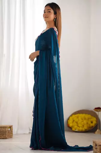 teal embroidered party wear saree