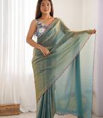 sea green women satin saree with sequinned border