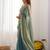 sea green women satin saree with sequinned border
