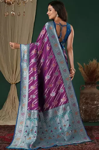 Purple purple ethnic motifs woven design zari silk blend banarasi saree unstiched blouse