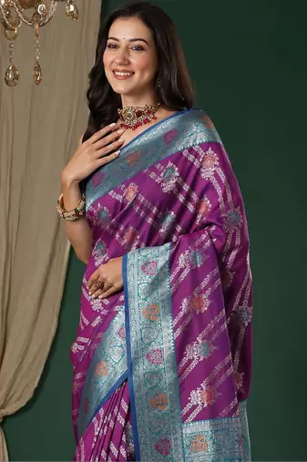 Purple purple ethnic motifs woven design zari silk blend banarasi saree unstiched blouse