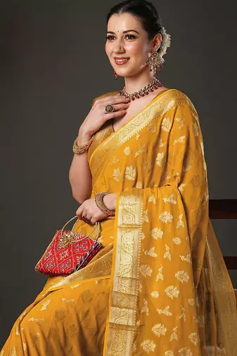 yellow ethnic motifs woven design zari georgette kanjeevaram saree