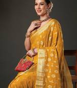 yellow ethnic motifs woven design zari georgette kanjeevaram saree