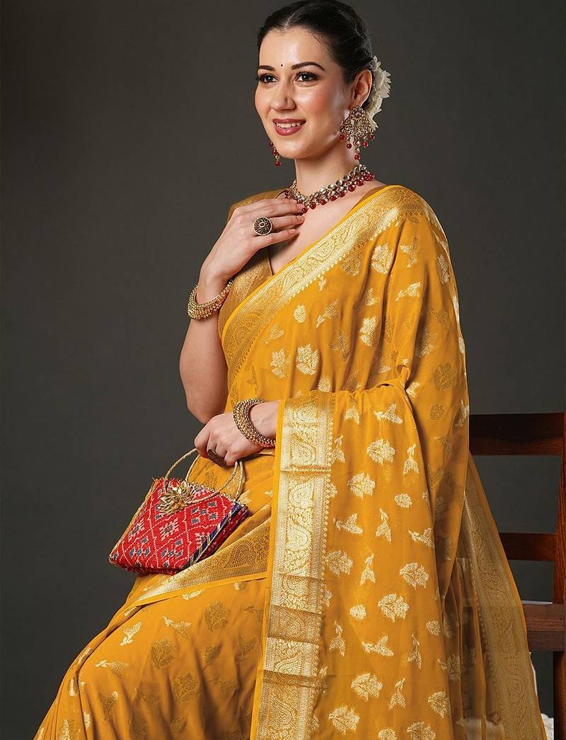 yellow ethnic motifs woven design zari georgette kanjeevaram saree
