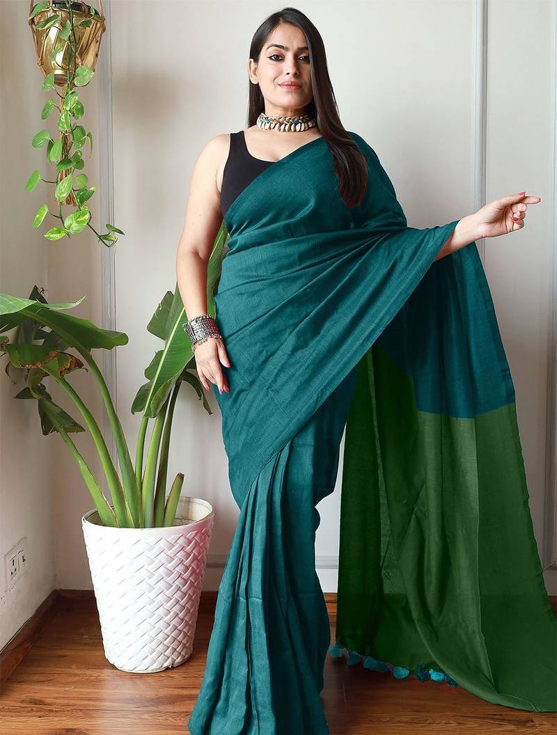 teal solid cotton blend saree