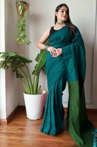 teal solid cotton blend saree