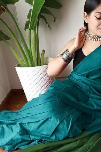 teal solid cotton blend saree