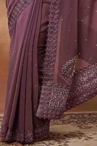 purple embroidered embellished georgette saree