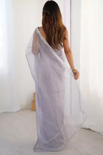 lavender embellished border sequinned net saree