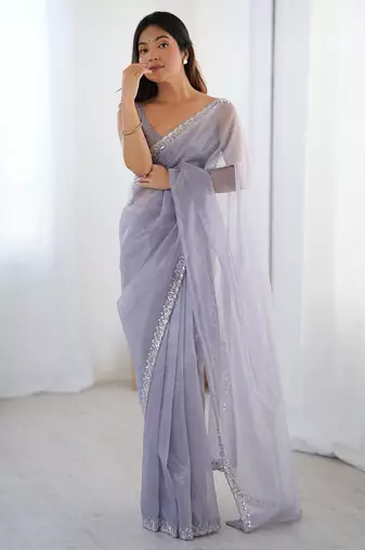 lavender embellished border sequinned net saree