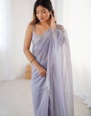 lavender embellished border sequinned net saree 4