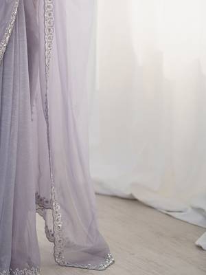 lavender embellished border sequinned net saree 5