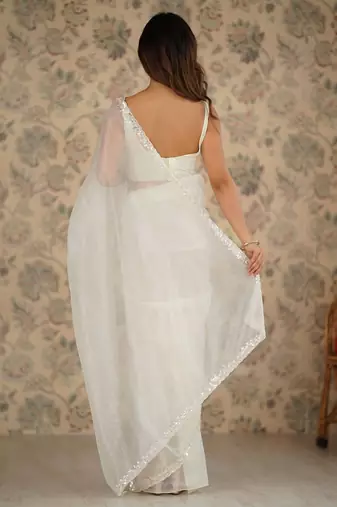 off white embroidered embellished beads and stones net saree