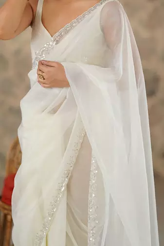 off white embroidered embellished beads and stones net saree