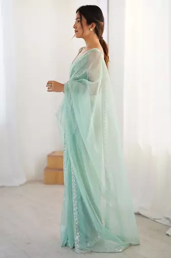 turquoise beads and stones embellished net party wear saree