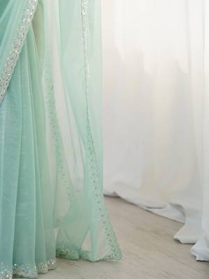 turquoise beads and stones embellished net party wear saree 5