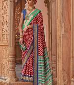 maroon & blue ethnic motifs printed zari banarasi silk blend saree