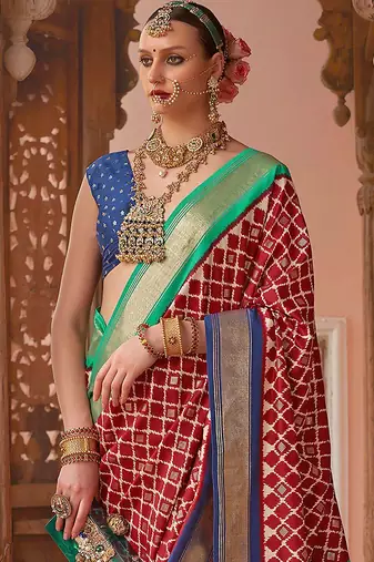 maroon & blue ethnic motifs printed zari banarasi silk blend saree