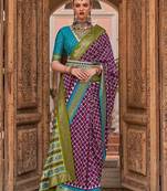 Purple woven design zari silk blend banarasi saree
