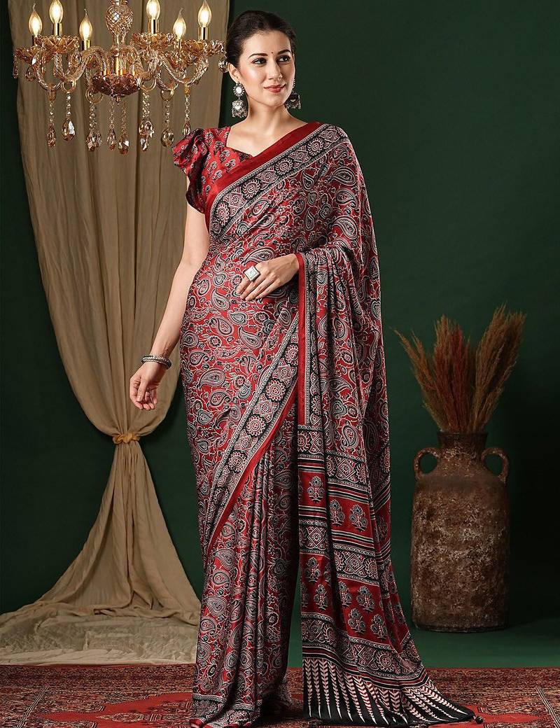 maroon ethnic motifs crepe saree