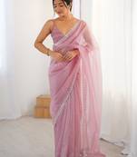 pink embellished border sequinned net saree