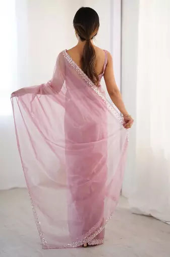 pink embellished border sequinned net saree