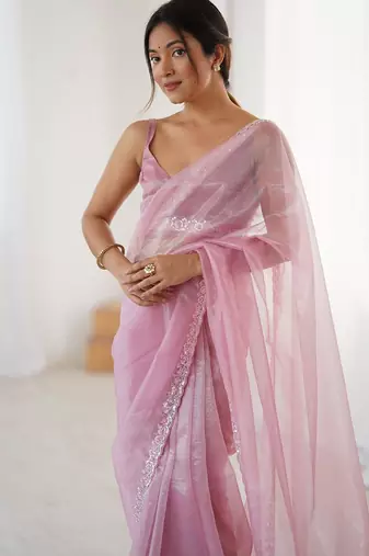 pink embellished border sequinned net saree